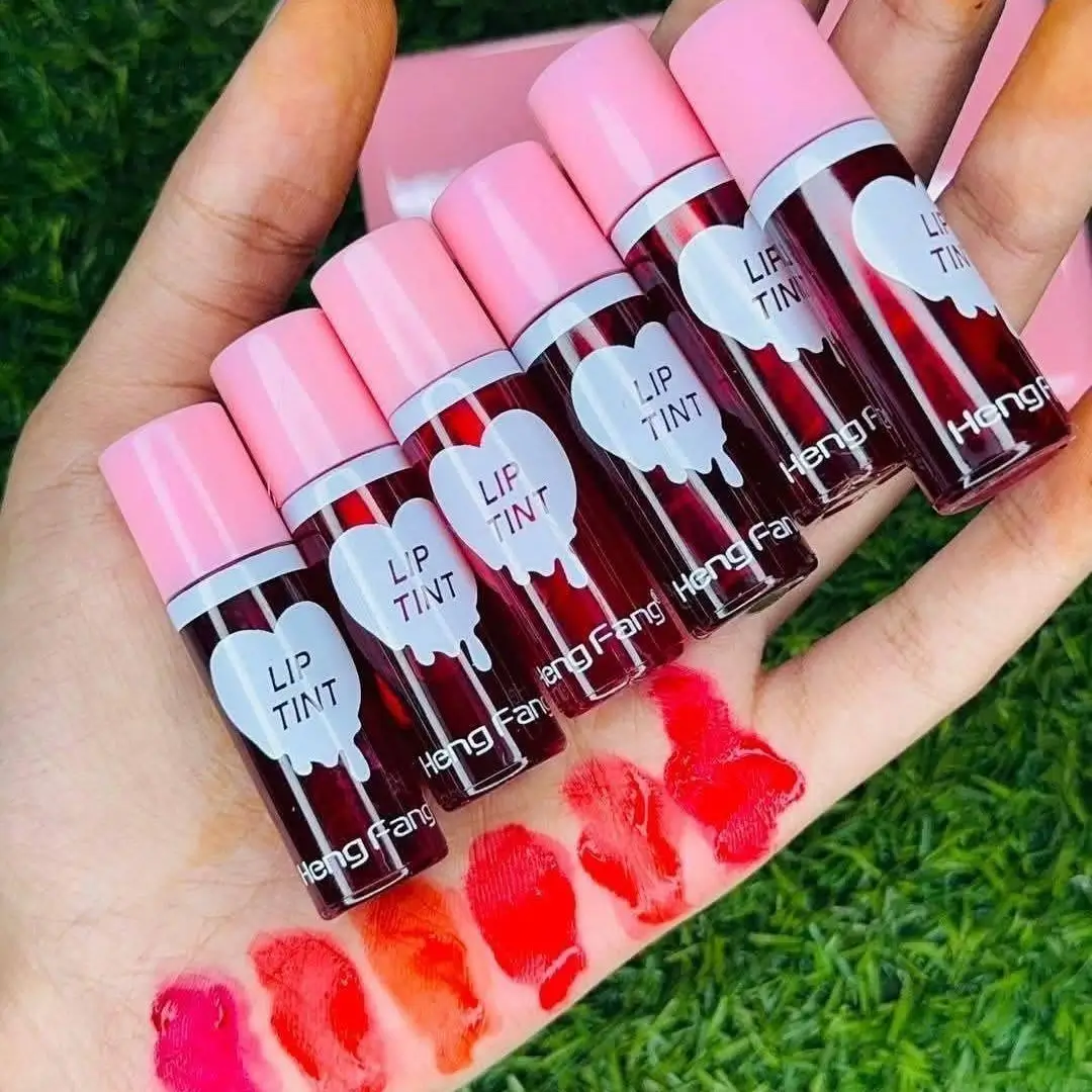 Heng Fang Mini Lip Tint Bottles with Color Swatches on Hand